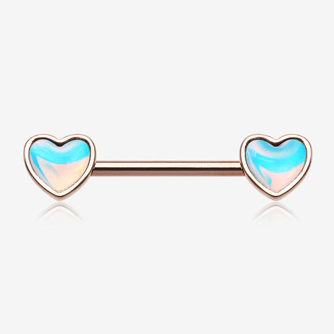 A Pair of Rose Gold Iridescent Revo Heart Nipple Barbell